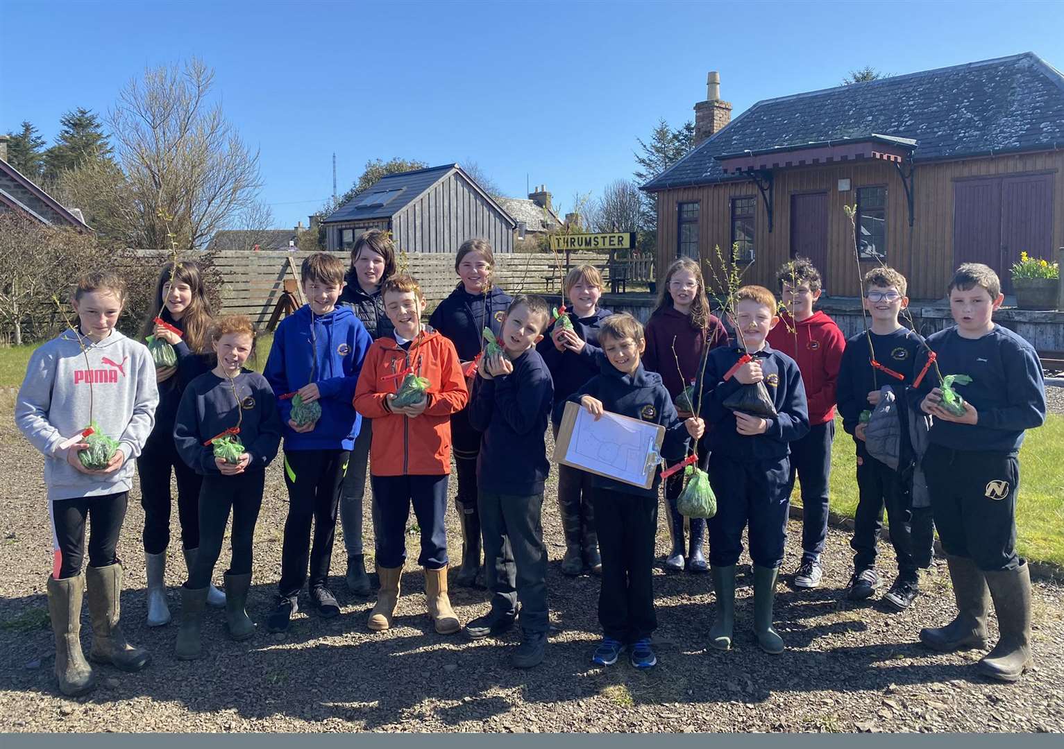 Pupils from P5-7 who joined in the planting session at the Thrumster station garden.