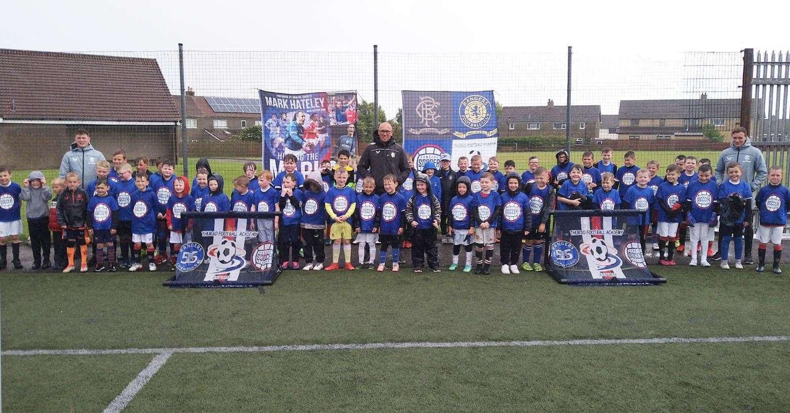Youngsters from the five-to-nine age group with Mark Hateley and the Rangers coaches.