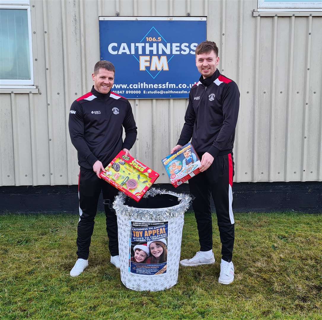 Davie Allan (left) and Andrew Hardwick donating toys on behalf of Wick Academy.
