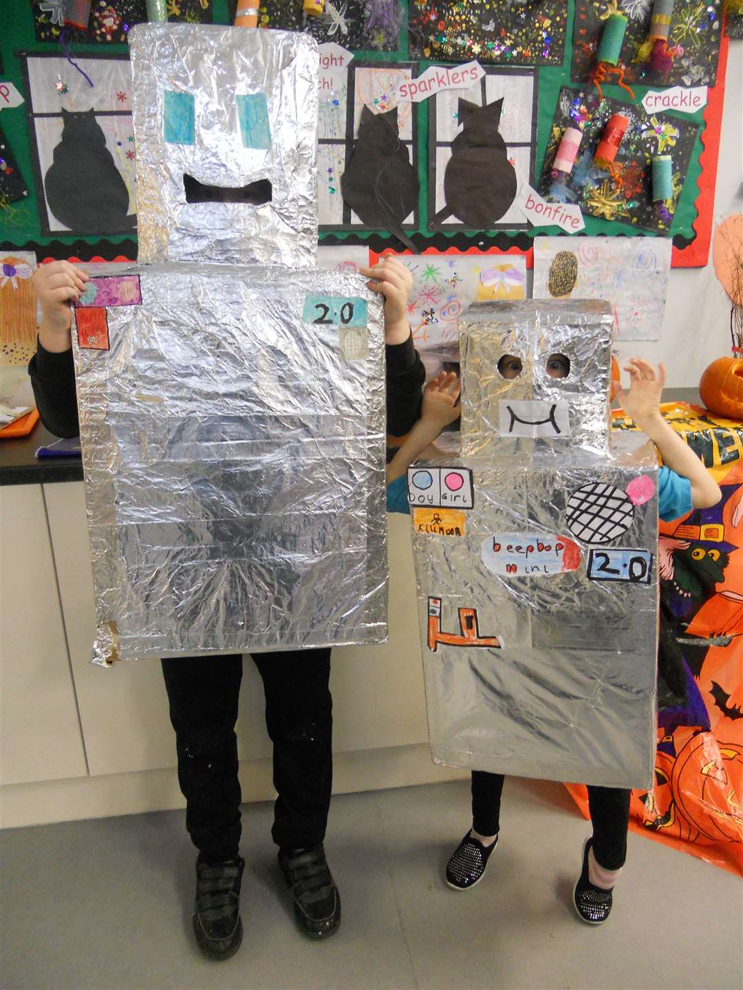 Brother and sister Sam (P6) and Scarlett (P2) Heddle made their own Beep Bop 2.0 and Beep Bop Mini costumes.