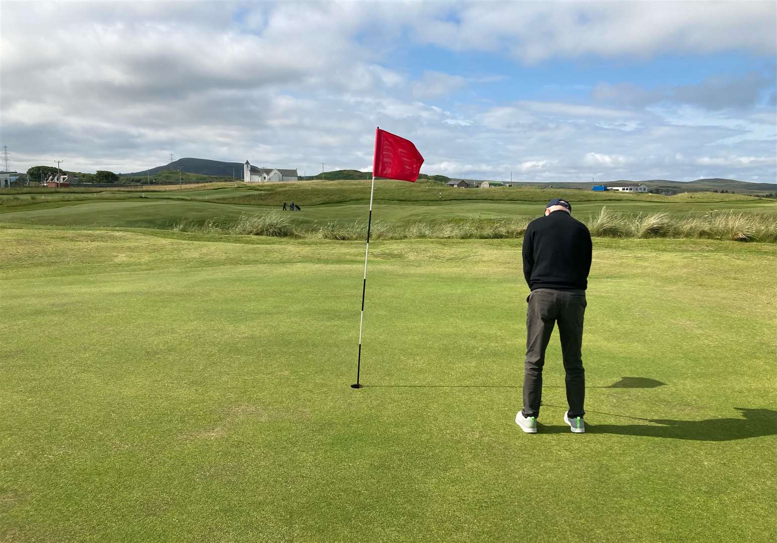Fred Groves putting on the 13th hole during the President's Salver competition at Reay on Saturday.