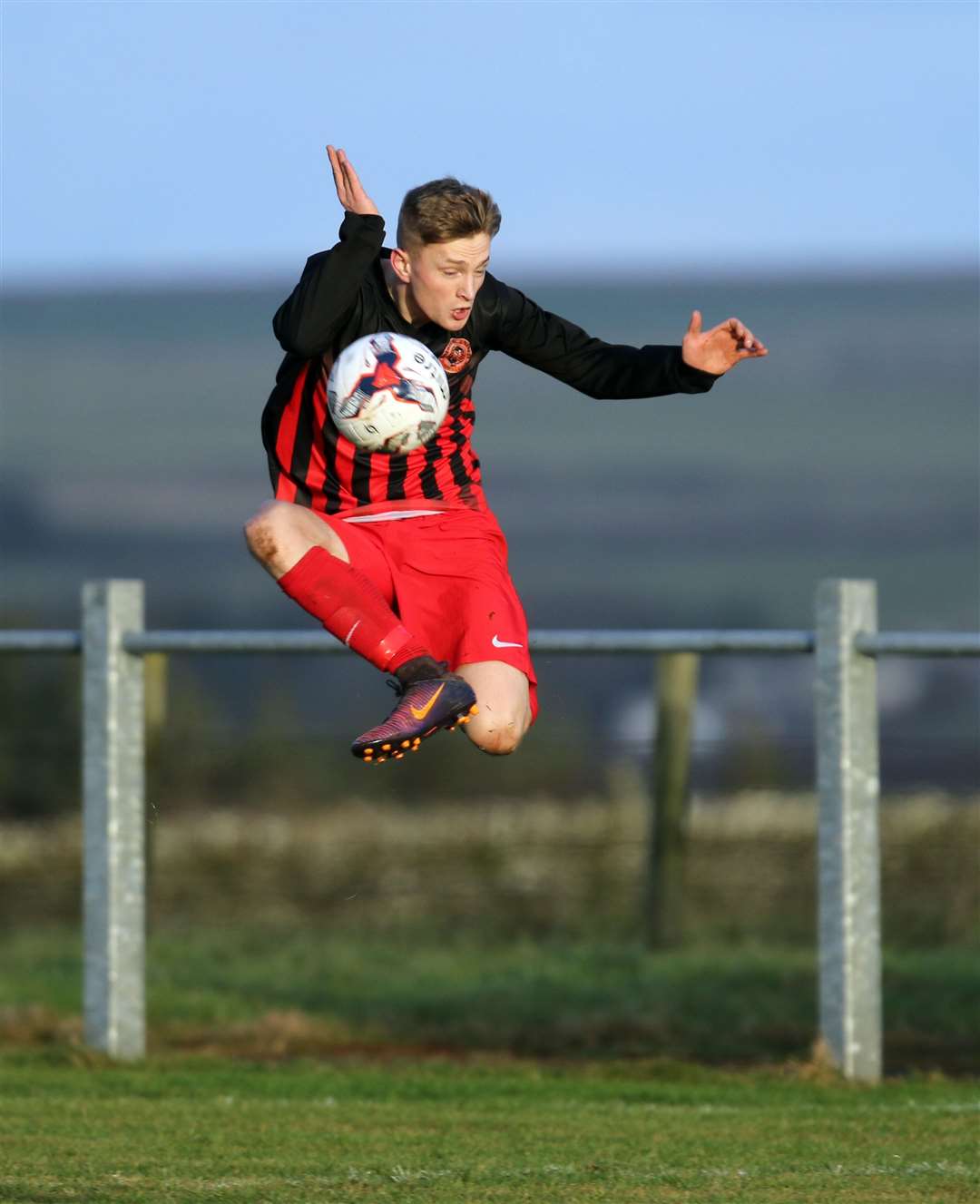 Halkirk United's Korbyn Cameron displays some aerial acrobatics during the Anglers' 4-0 home defeat to Golspie Sutherland. Picture: James Gunn