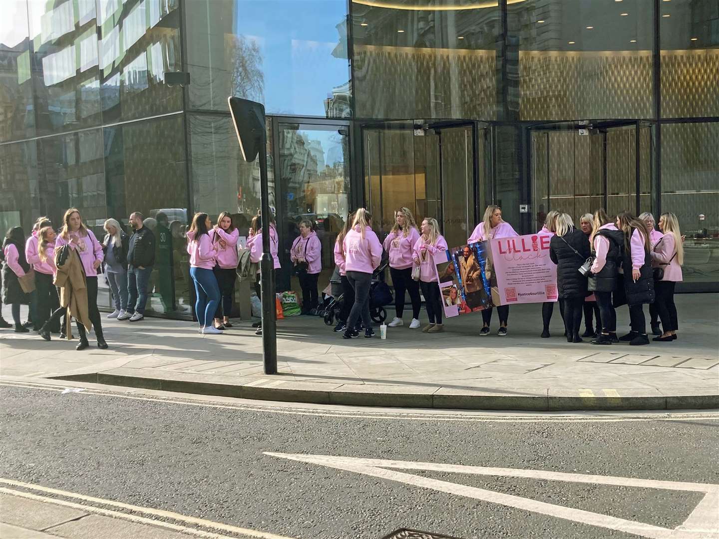 Friends and family of Lillie Clack dressed in pink during a protest outside the Old Bailey (Emily Pennink/PA)