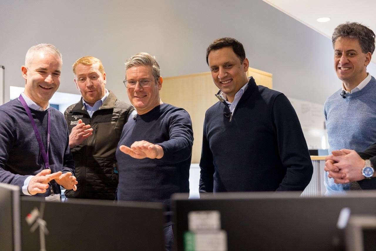Sir Keir Starmer (centre), Anas Sarwar (second from right) and Ed Miliband (right) meeting staff at the Beatrice operations and maintenance base in Wick. Picture: The Labour Party
