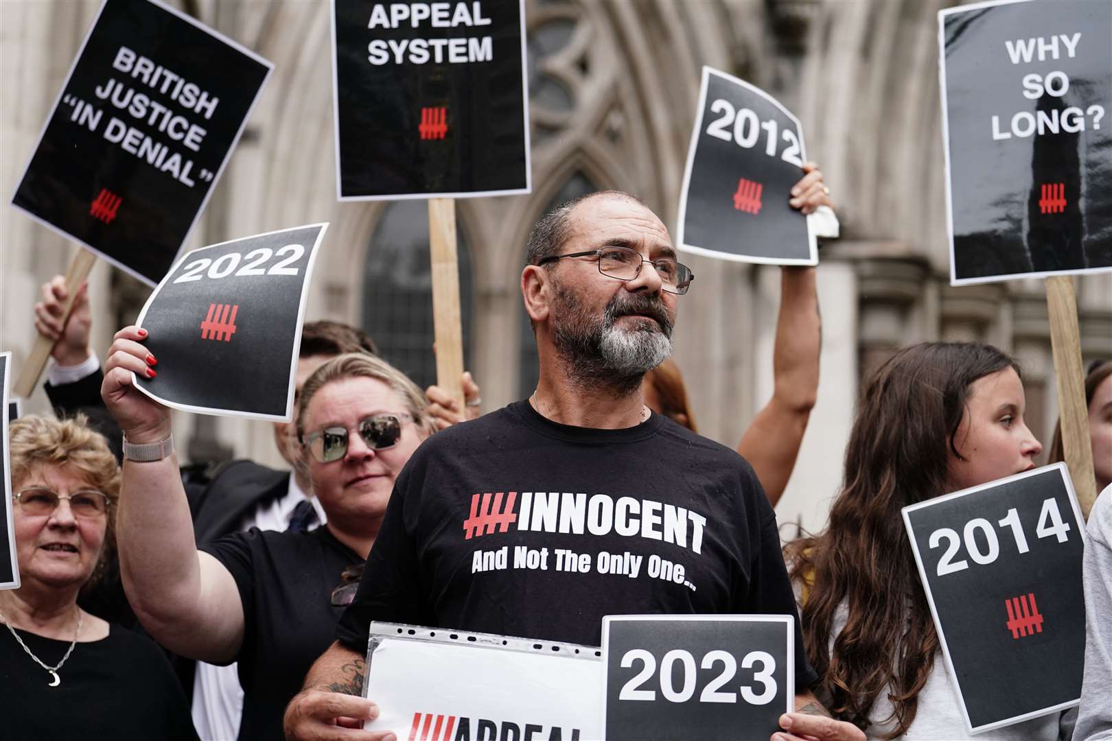 Andrew Malkinson, who served 17 years in prison for a rape he did not commit, outside the Royal Courts of Justice after being cleared by the Court of Appeal (Jordan Pettitt/PA)