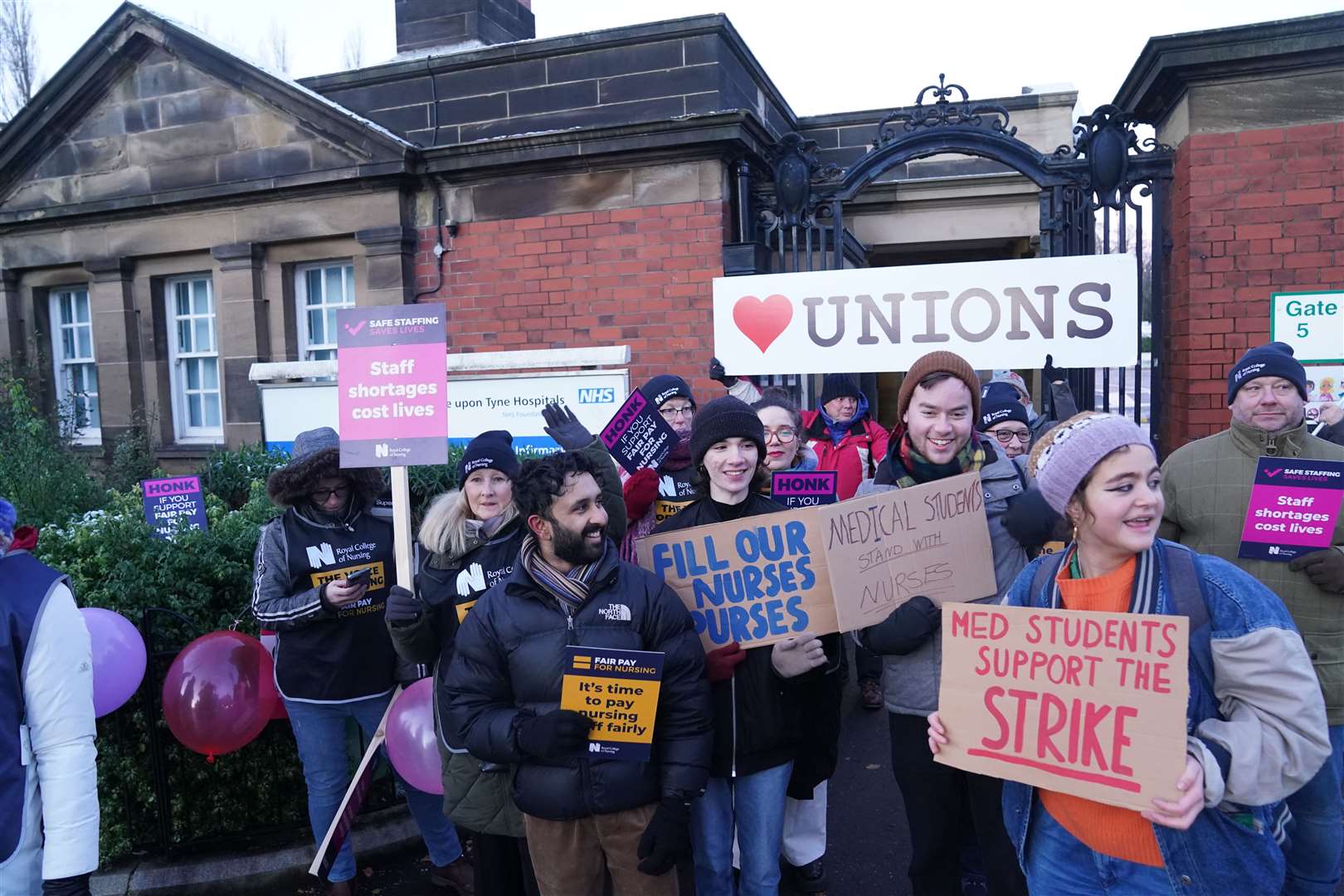 Members of the Royal College of Nursing on the picket line outside the Royal Victoria Infirmary in Newcastle (Owen Humphreys/PA)