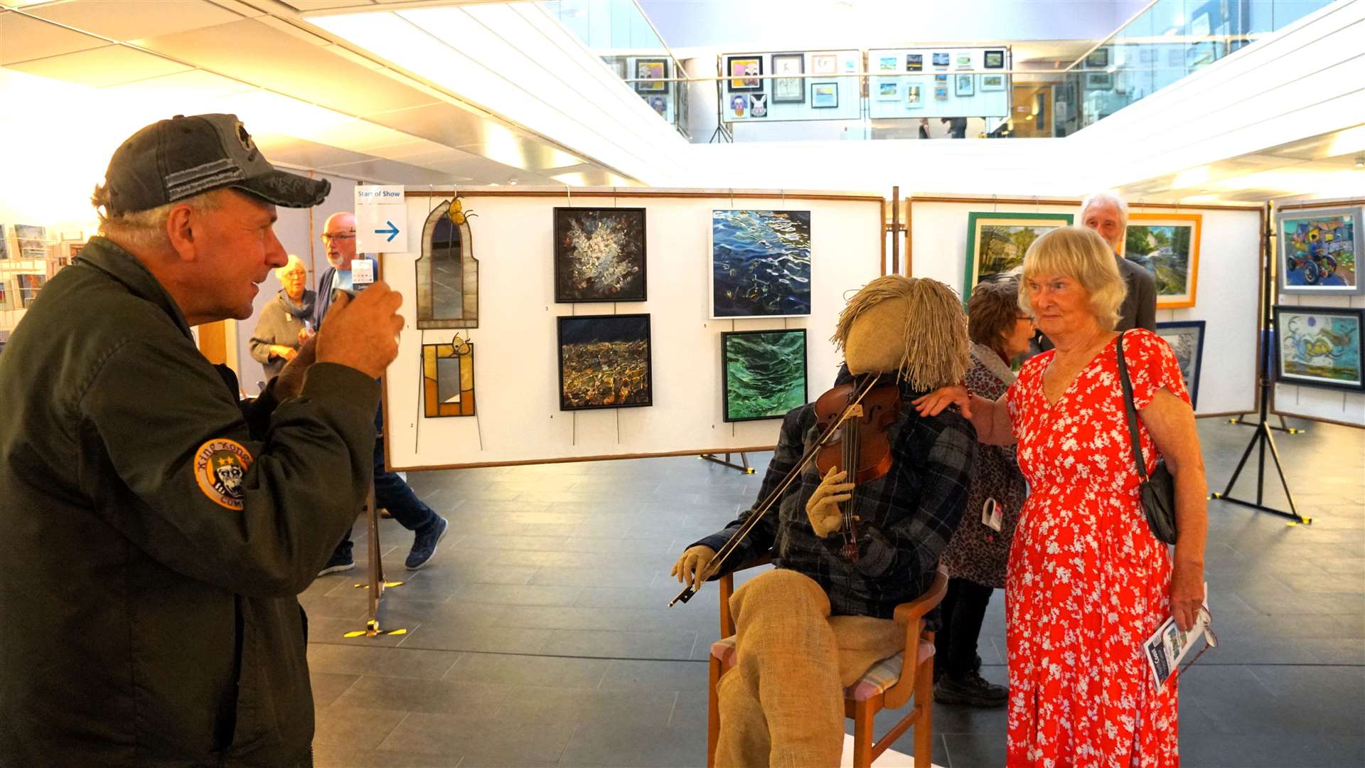 'Say cheese!'. Artist Ian C Scott takes a snap of Denise Imrie, wife of the late former chair of SCA Mike Imrie. Picture: DGS