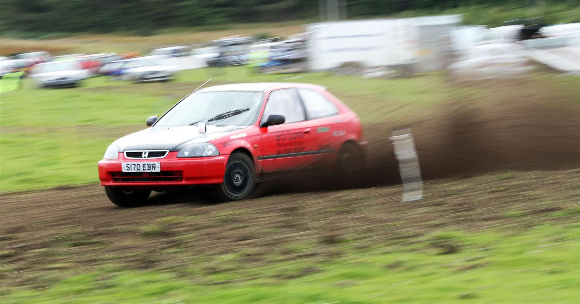 Gordie Donn in his Honda Civic kicks out the dirt on his way to winning his class and third fastest time of the day. Picture: James Gunn