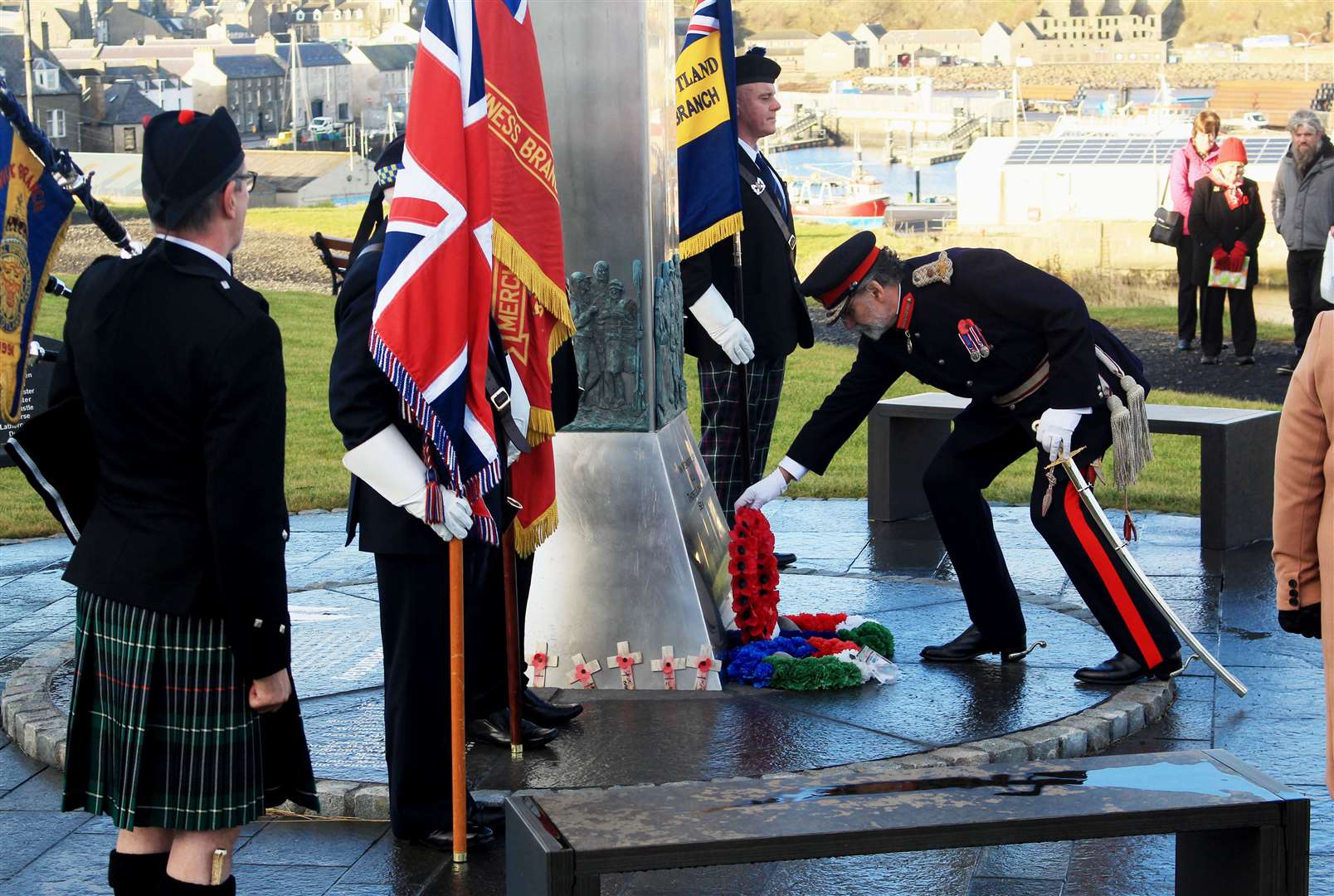Lord Thurso laying a wreath at Seafarers Memorial on Remembrance Sunday. Picture: Alan Hendry