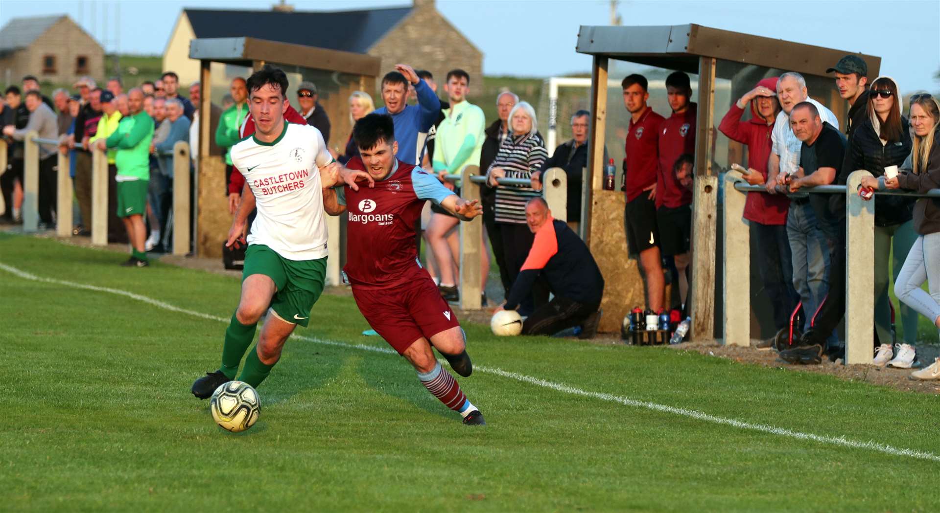Castletown's Jordan McKechnie and Pentland United's Sean Campbell battle for the ball at Ham Park. Picture: James Gunn