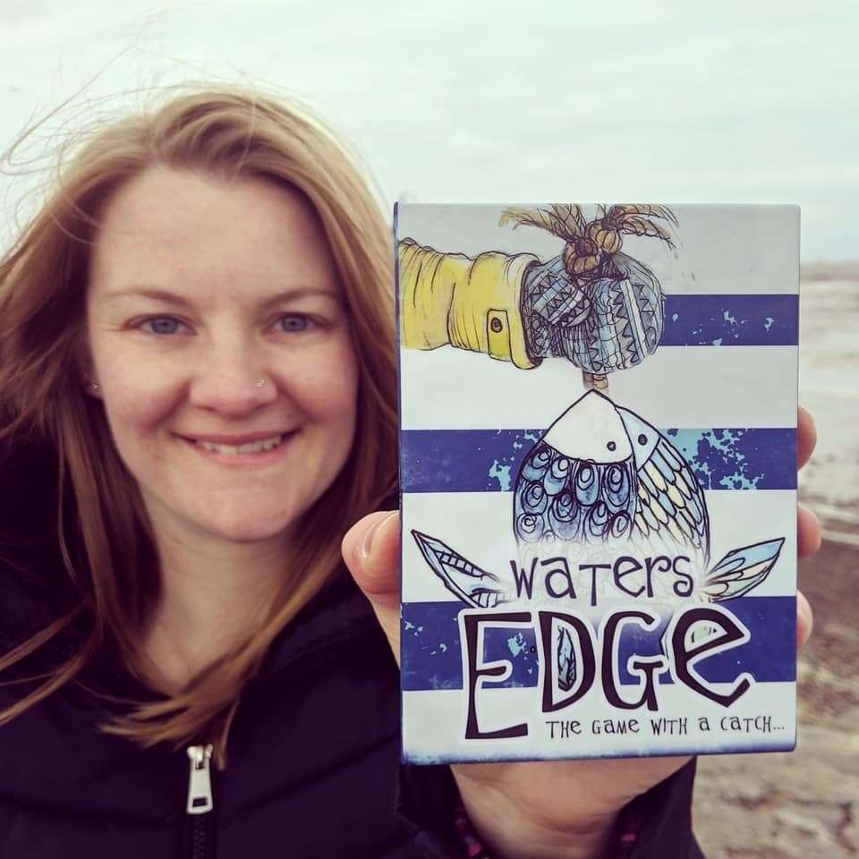 Catherine Redgate with her Waters Edge board game.