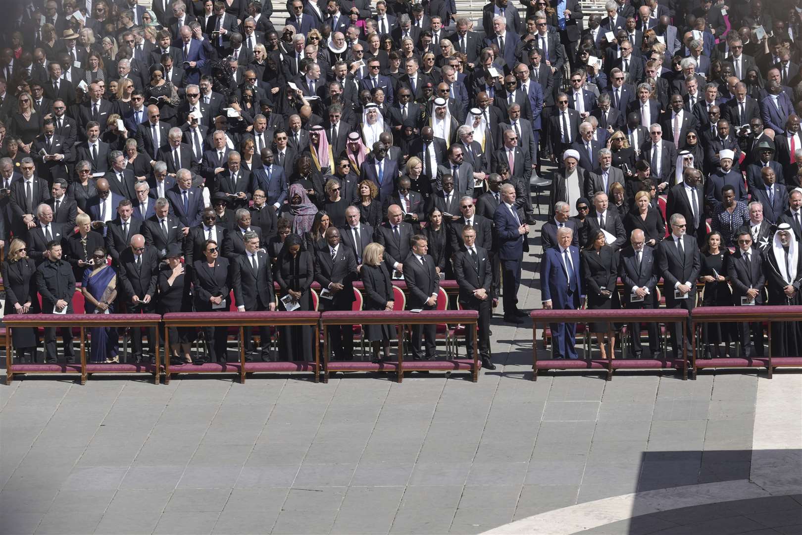 Ukraine’s President Volodymr Zelensky, front second left, French President Emmanuel Macron, front centre, and US President Donald Trump, seventh right, during the funeral (Markus Schreiber/AP)