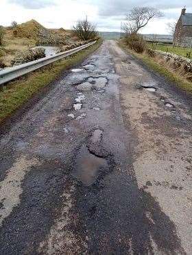 This picture of pot holes at Weydale was sent to the First Minister