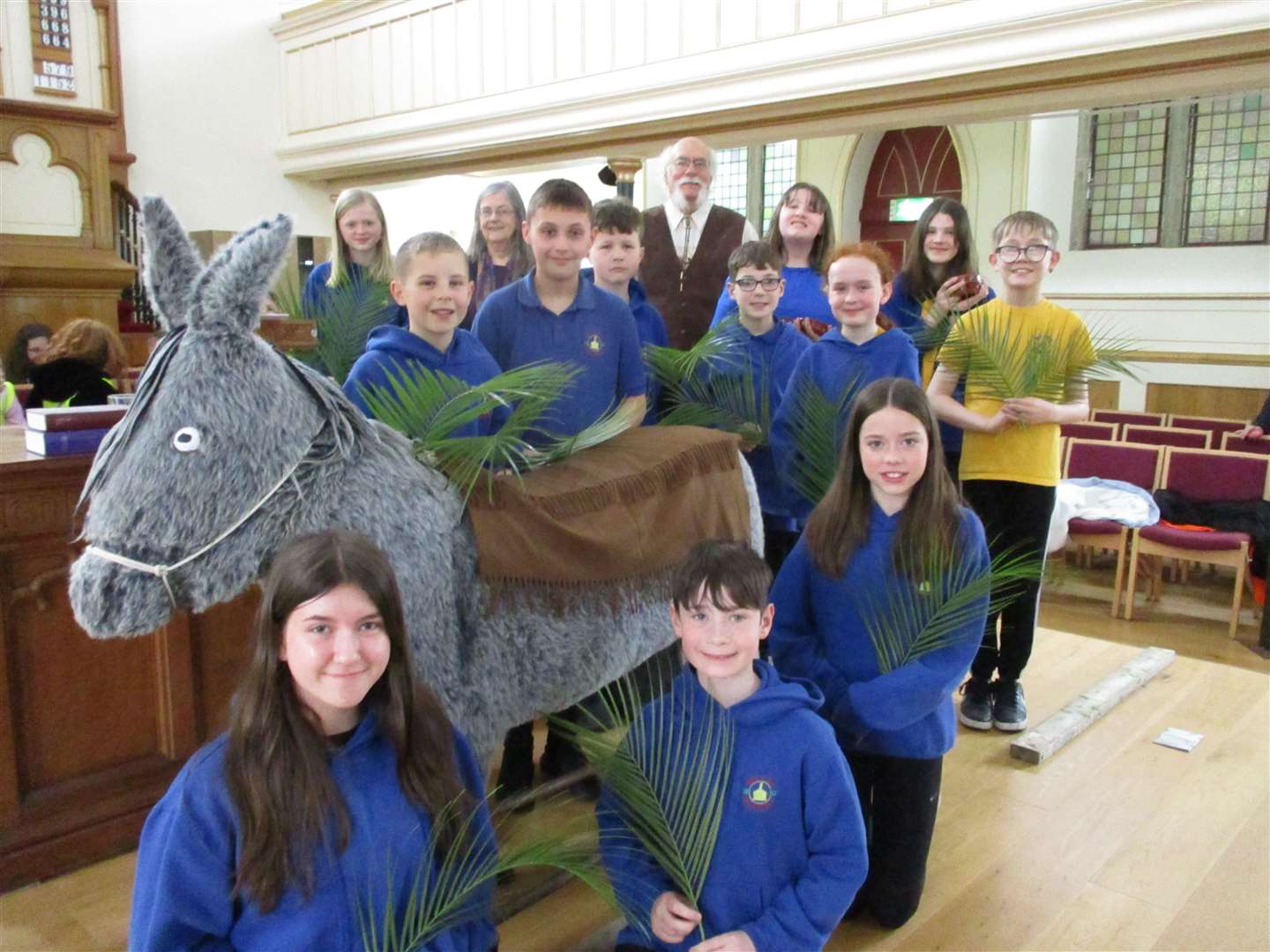 The donkey prop was a big hit with the pupils, seen here with (back) Wendy and Peter Hylton.