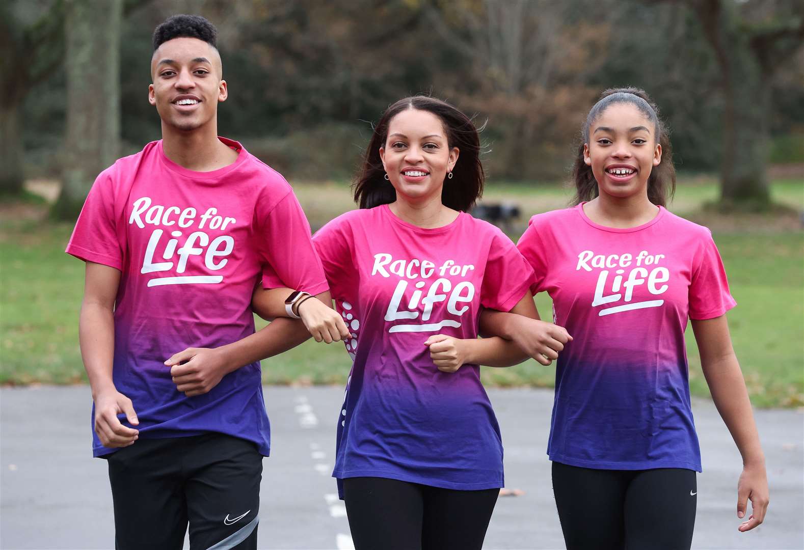 Cancer survivor Crystal Manuel (centre) with her children Cameron, 15, and Chala, 13.