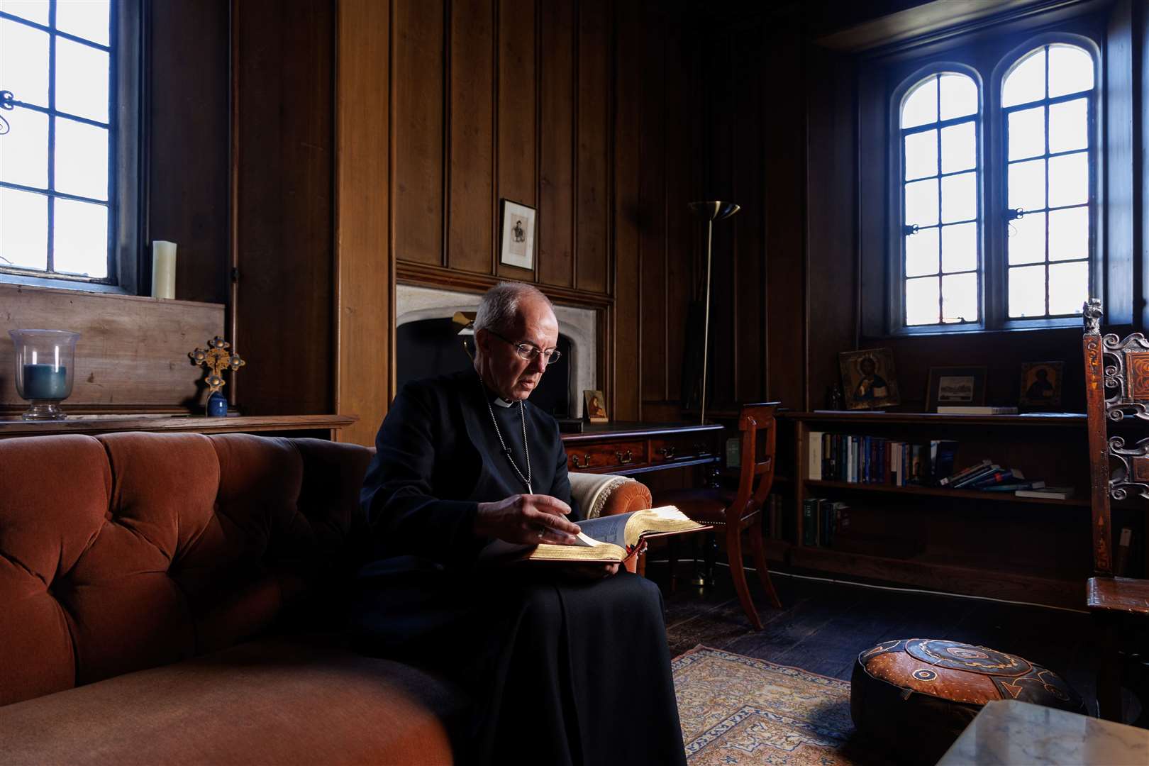 The Archbishop of Canterbury, the Most Revd Justin Welby, reading the King’s Coronation Bible in the Cranmer Study at Lambeth Palace (Neil Turner for Lambeth Palace/PA)