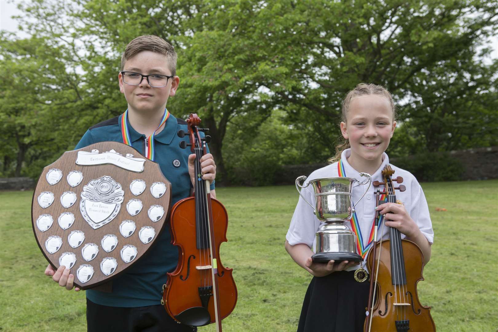 Liam Bruce, of Newton Park, won the Jack Duncan Memorial Shield for violin/viola solo, while Phoebe Bain, from Thurso, won the Thurso Strathspey and Reel Society Cup for Scots fiddle solo, primary school. Picture: Robert MacDonald / Northern Studios