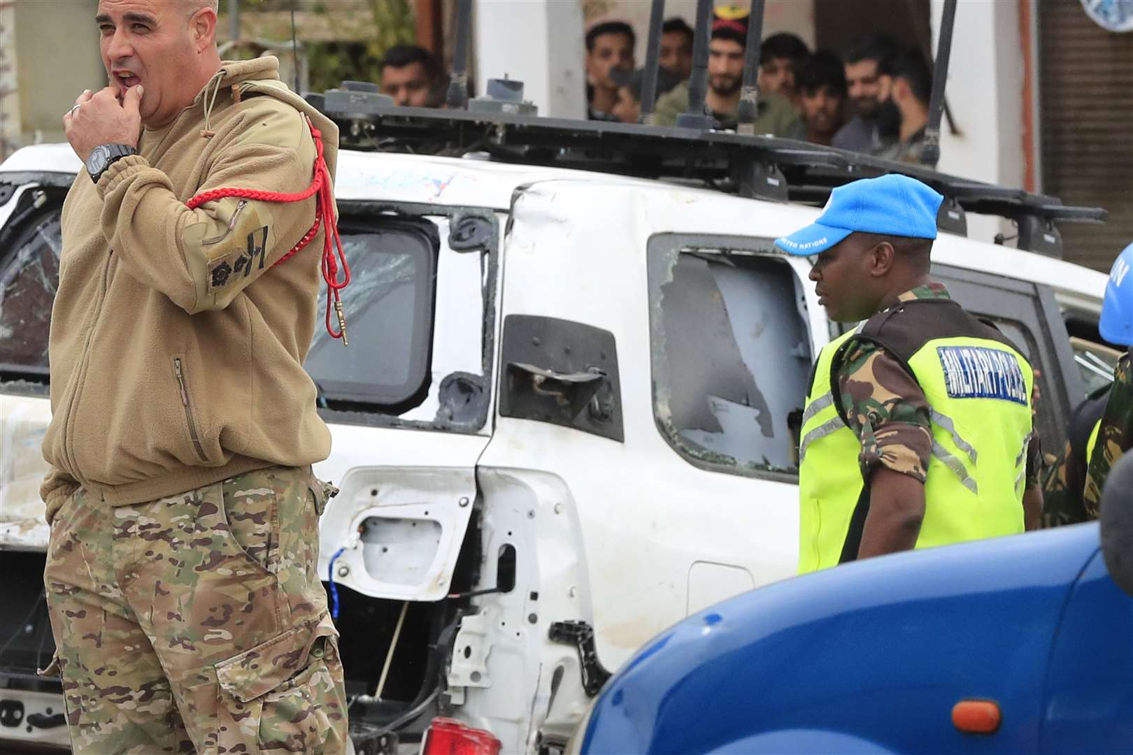 A damaged UN peacekeeper vehicle at the scene of the attack (Mohammed Zaatari/AP)