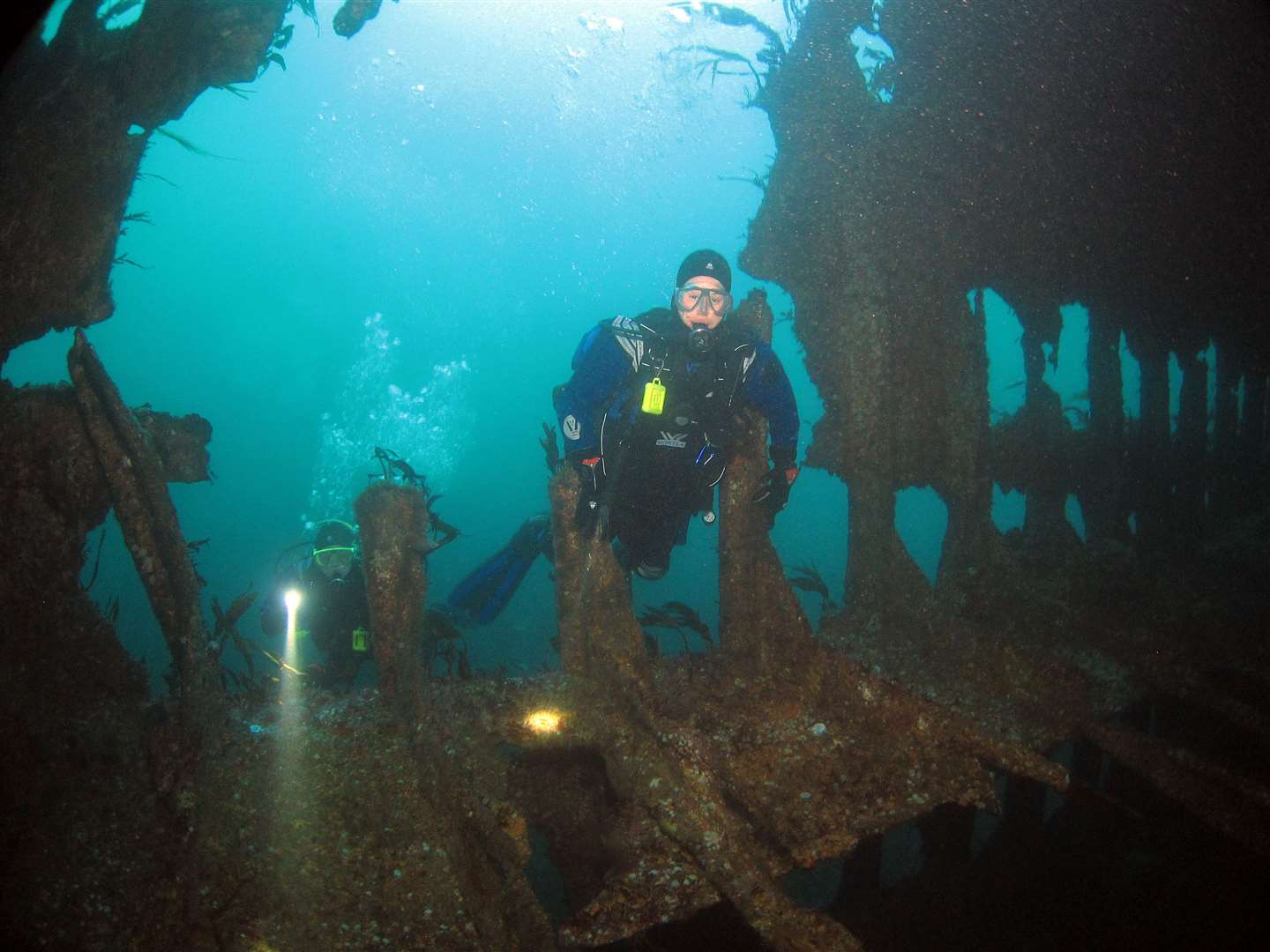 Diver entering the wreck of the Tabarka, a Scapa Flow blockship.