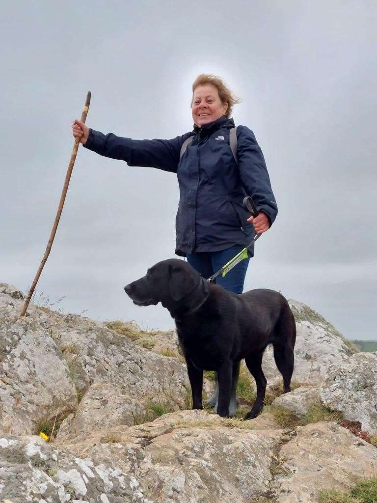 Tiggi Trethowan with her guide dog black Labrador Jackie (Tiggi Trethowan/PA)
