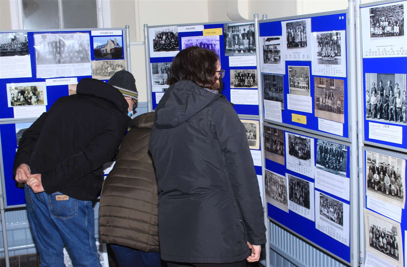 Visitors showed great interest in a display of old school photos. Picture: Alan Hendry