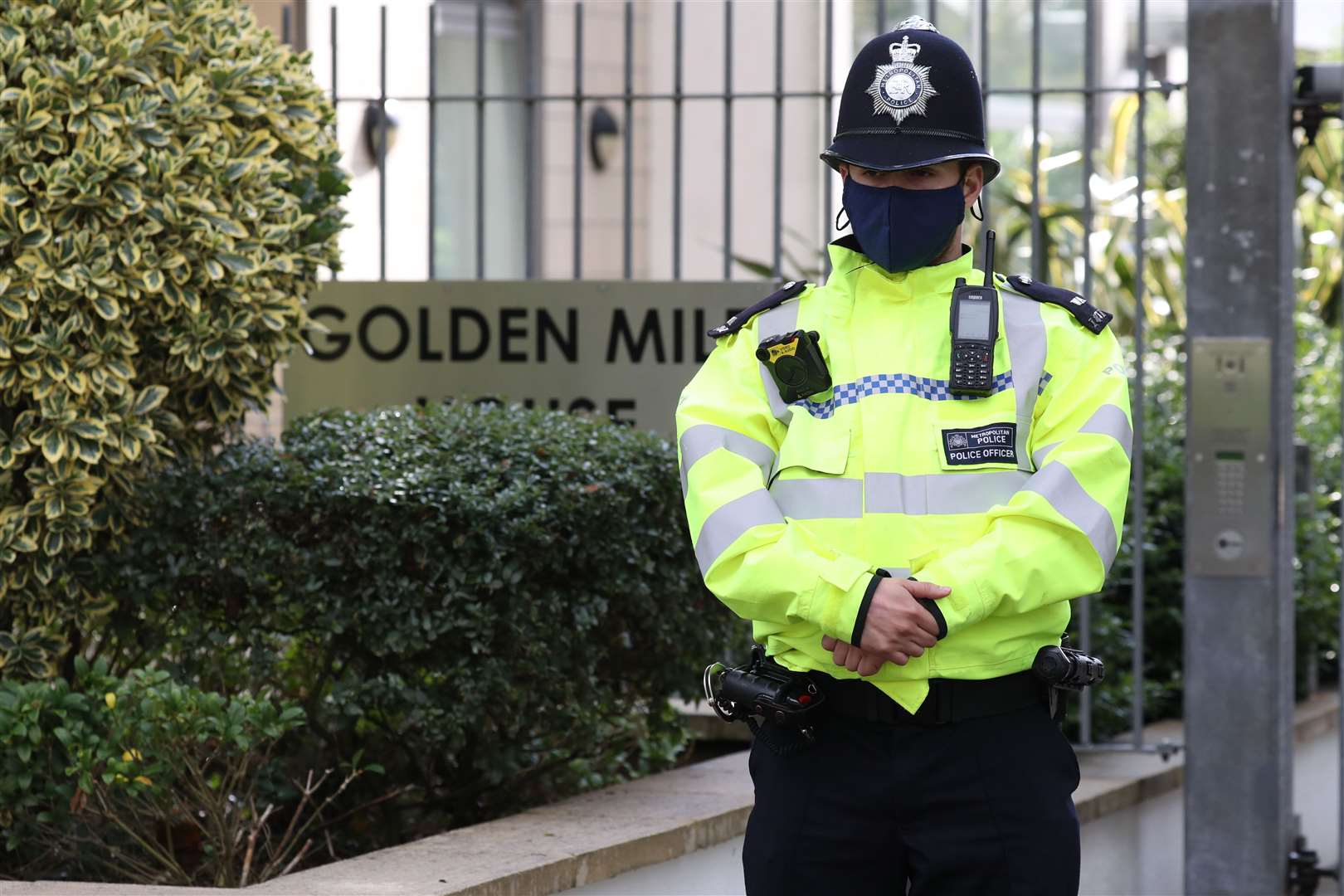 A police officer stands outside Golden Mile House in Clayponds Lane (Jonathan Brady/PA)