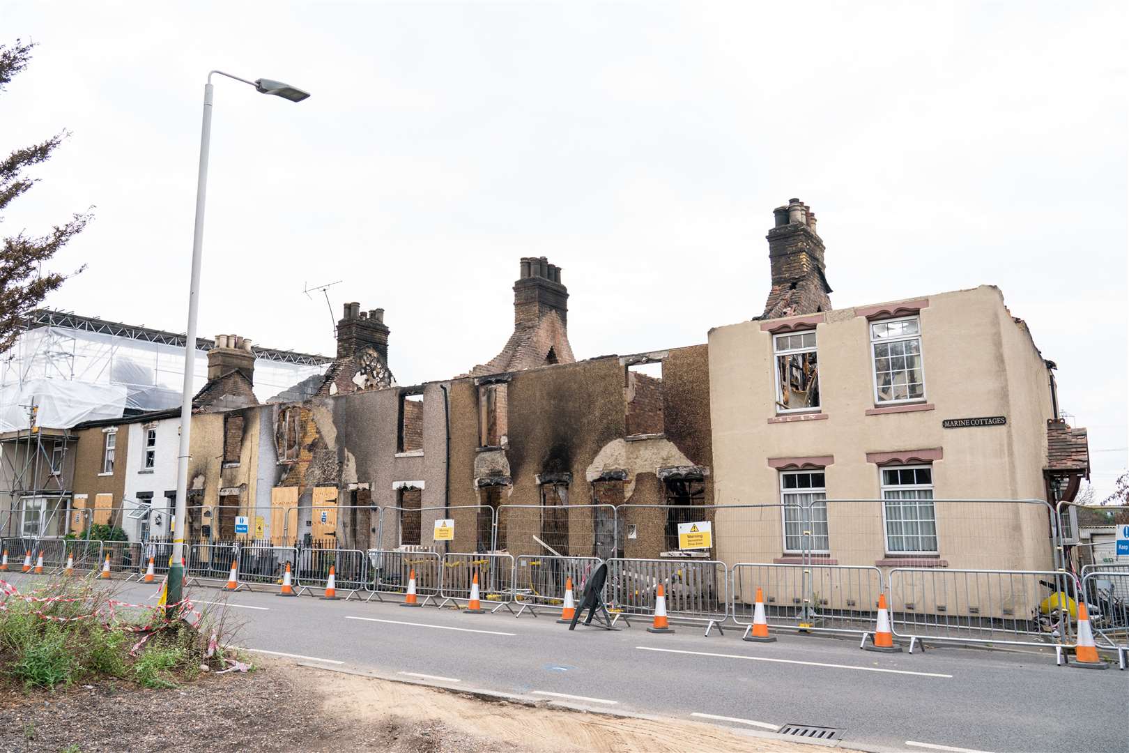 Fire-damaged homes in the village of Wennington in east London in the aftermath of the July 2022 heatwave (Dominic Lipinski/PA)