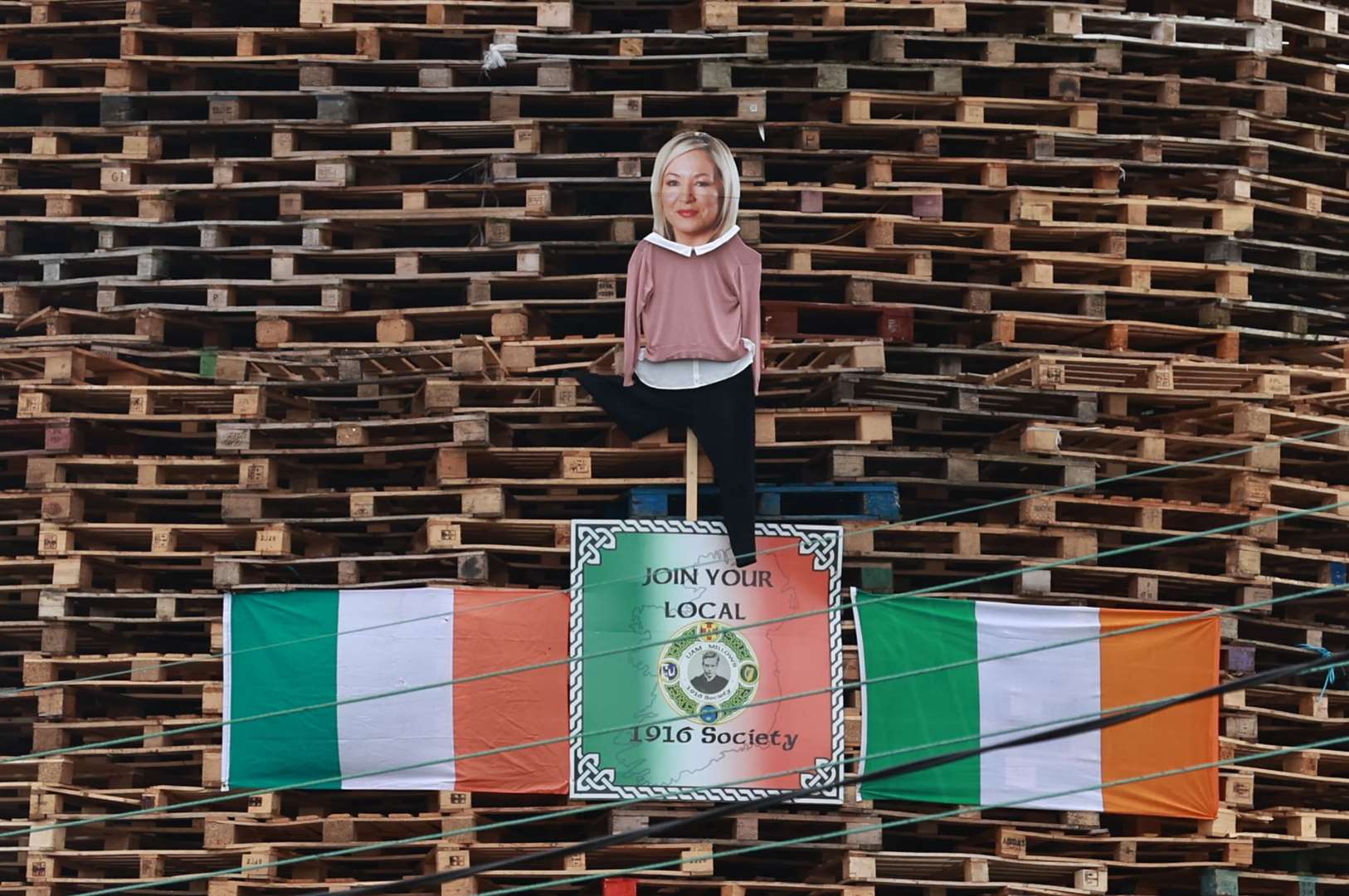 An effigy of Sinn Fein vice president Michelle O’Neill appeared on the Eastvale Avenue bonfire in Dungannon (Liam McBurney/PA)
