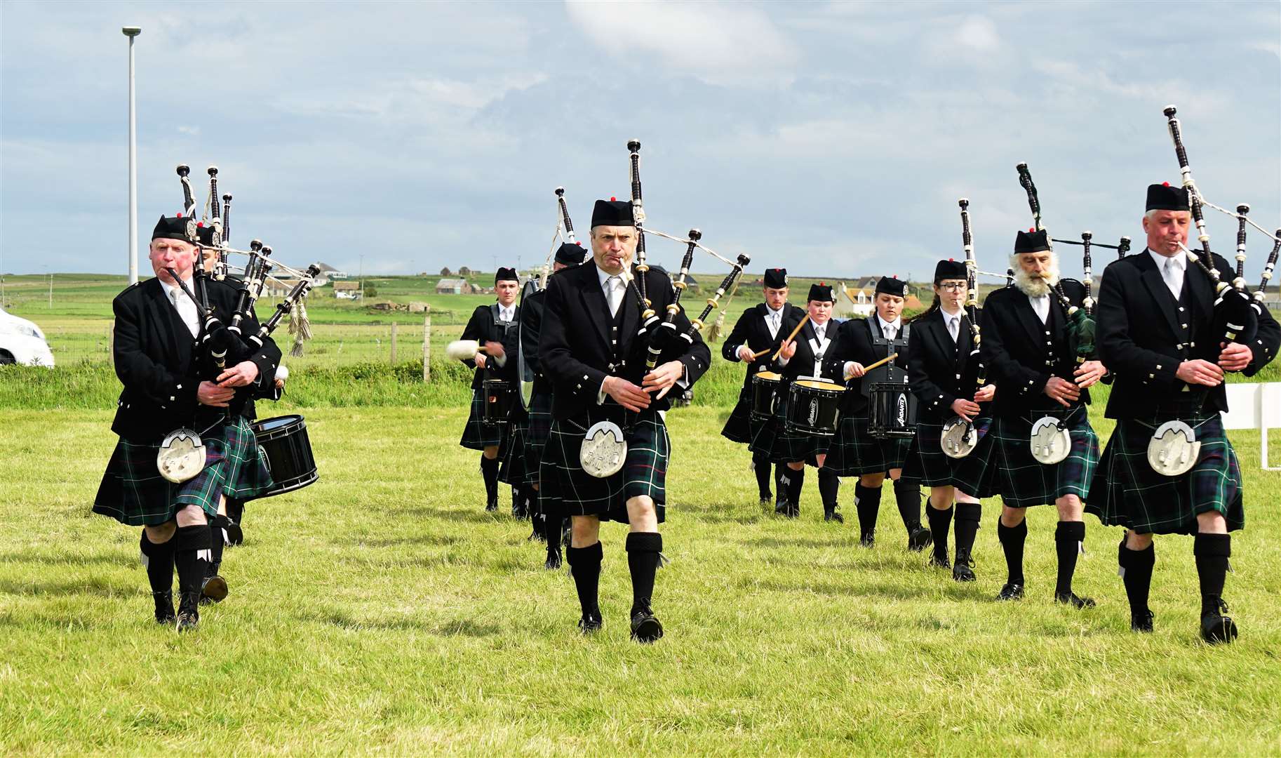 Wick RBLS Pipe Band take the field. Picture: DGS