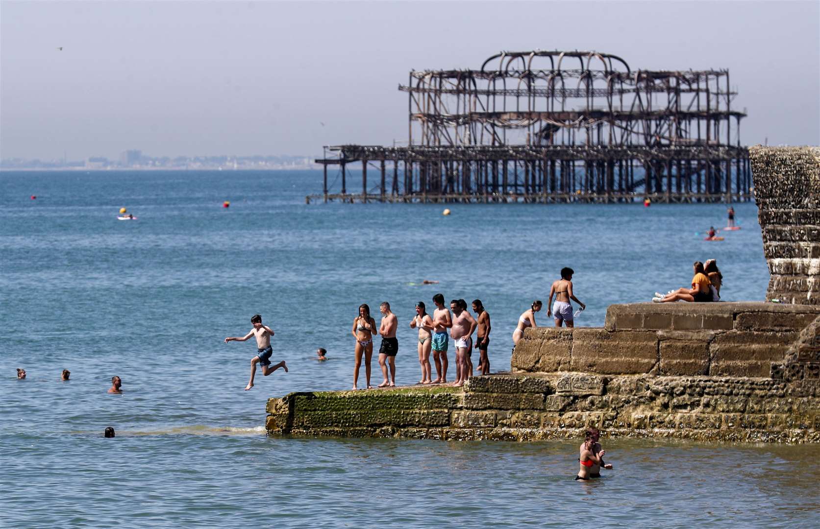 Sun-seekers at Brighton beach on August 7 (Steve Parsons/PA)