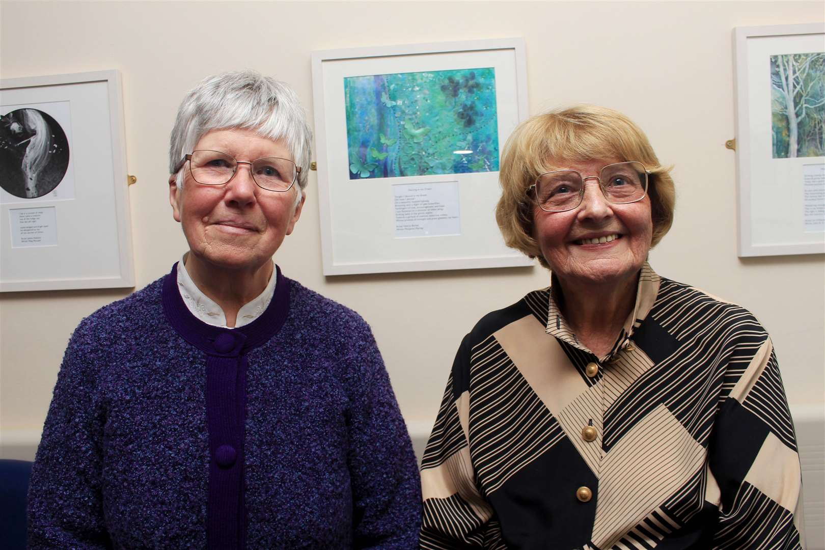 Artist Valerie Barker (left) and writer Margaret Mackay beside one of their joint works. Picture: Alan Hendry