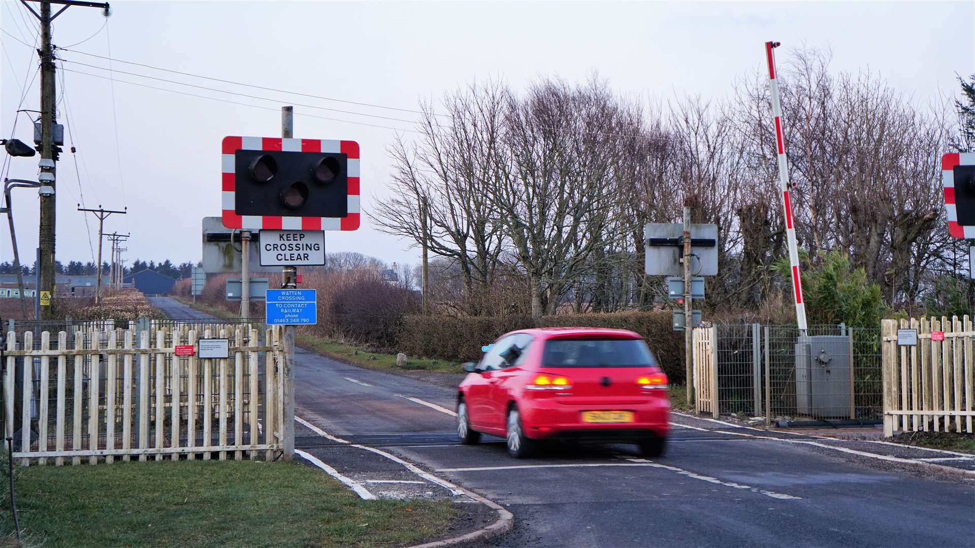 Vehicles were able to go through the Watten level crossing but when trains were due a special vehicle was present to stop access. Picture: DGS