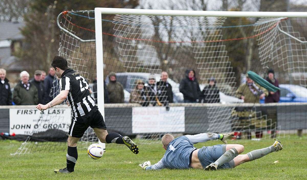 Sam Mackay rounds off the scoring in a 4-0 victory over Huntly. Picture: Bob Roger