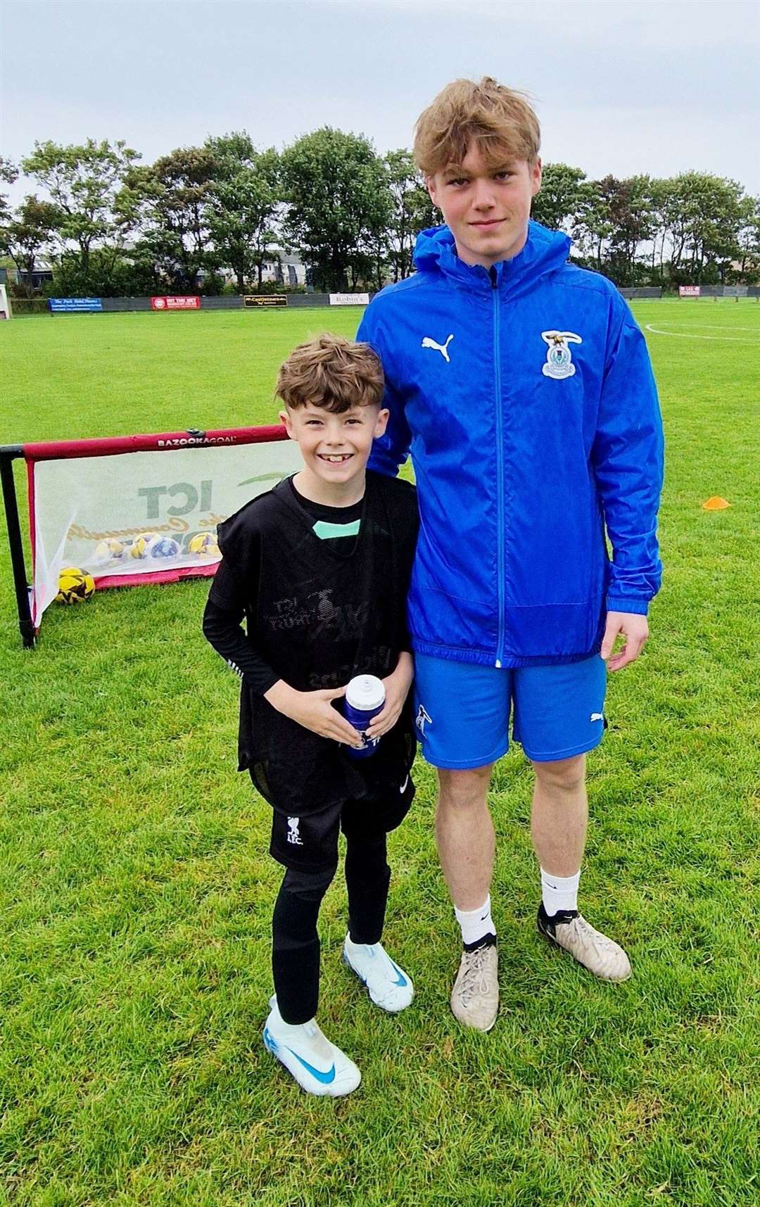 Robbie Calder with Sam Reid.