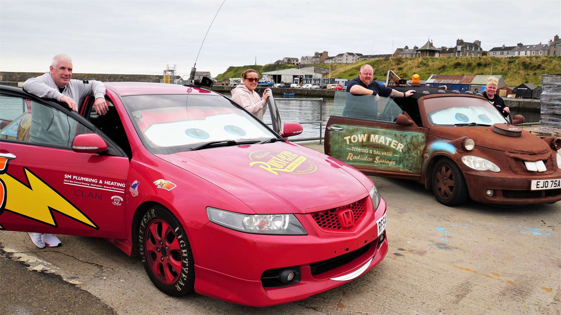 From left, Scott and Anita Morrison with their car Lightning McQueen next to Billy and Yvonne Campbell with Tow Mater. Pictures: DGS