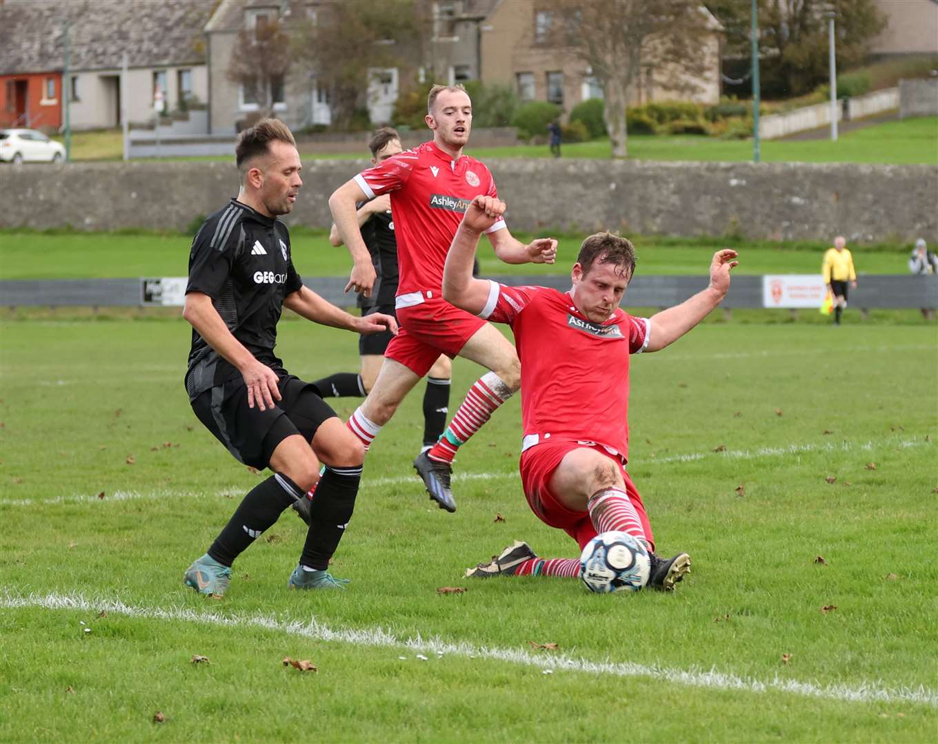 Thurso defender Stuart Sinclair stops an Invergordon attack. Picture: James Gunn