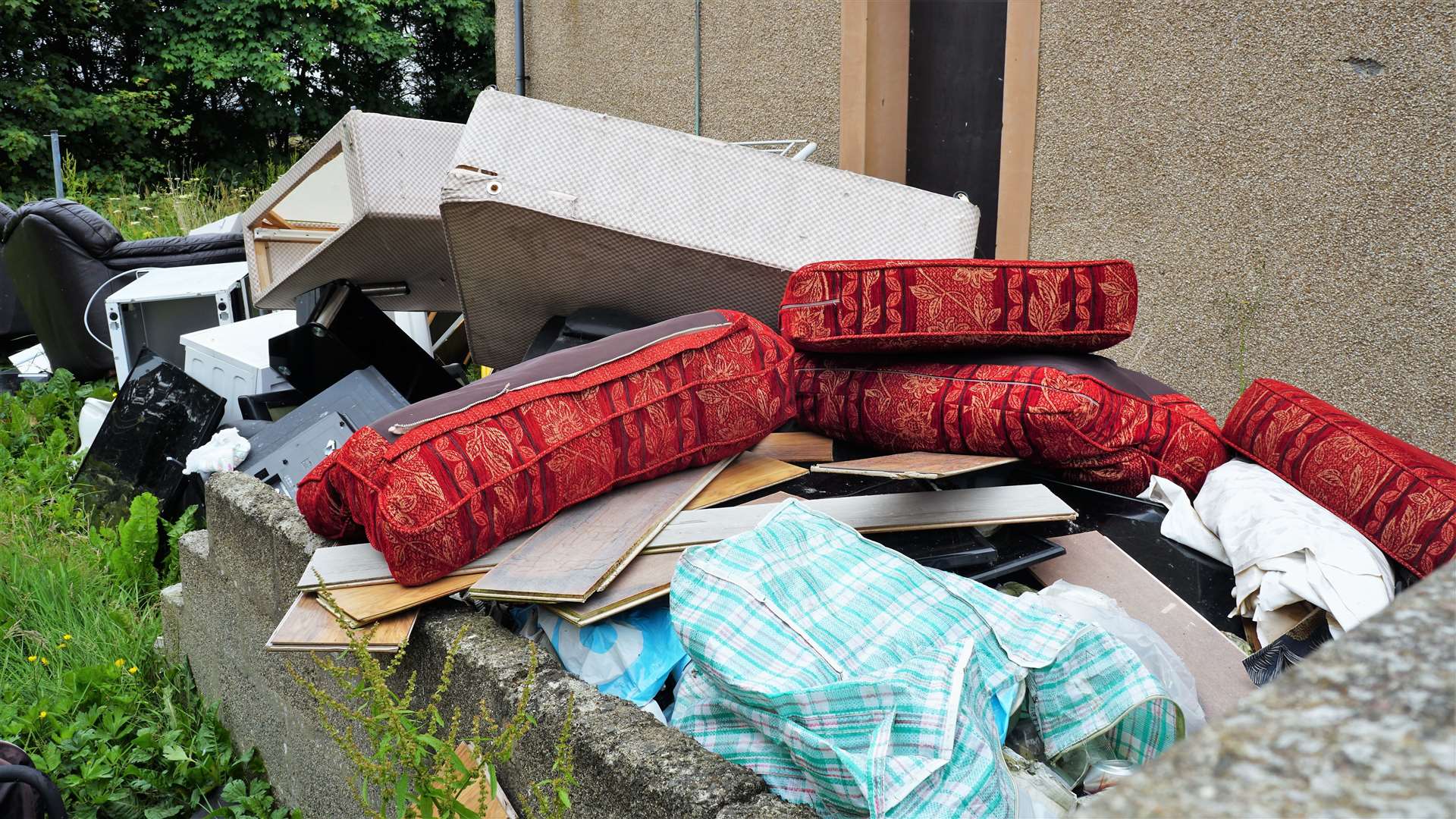 Persistent organic pollutants are within much of the domestic seating that Highland Council has to recycle. Fly-tipped furniture at Kennedy Terrace in Wick. Pictures: DGS
