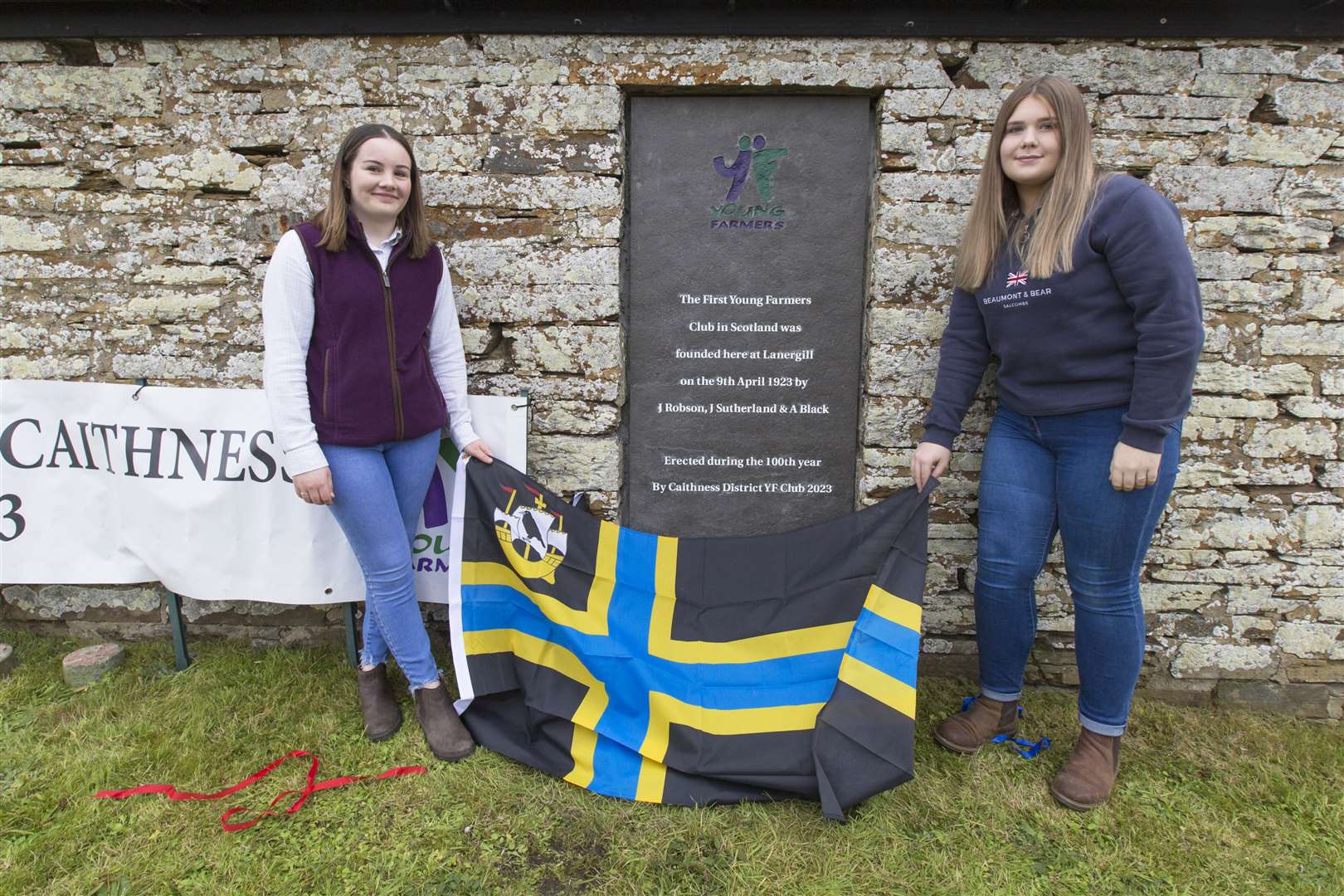 The Young Farmers' commemorative stone was unveiled by Iona Campbell (left), of Bower Young Farmers, and Alana Ross, from the Forss club. Picture: Robert MacDonald / Northern Studios