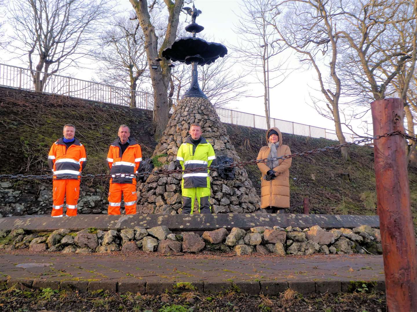 Joanna Coghill, chairperson of the Royal Burgh of Wick Community Council, at the fountain with (from left) Kevin Anderson (G&A Barnie), Paul McQuade (BAM Nuttall) and Andrew Henderson (SSEN Transmission). Picture: Willie Watt