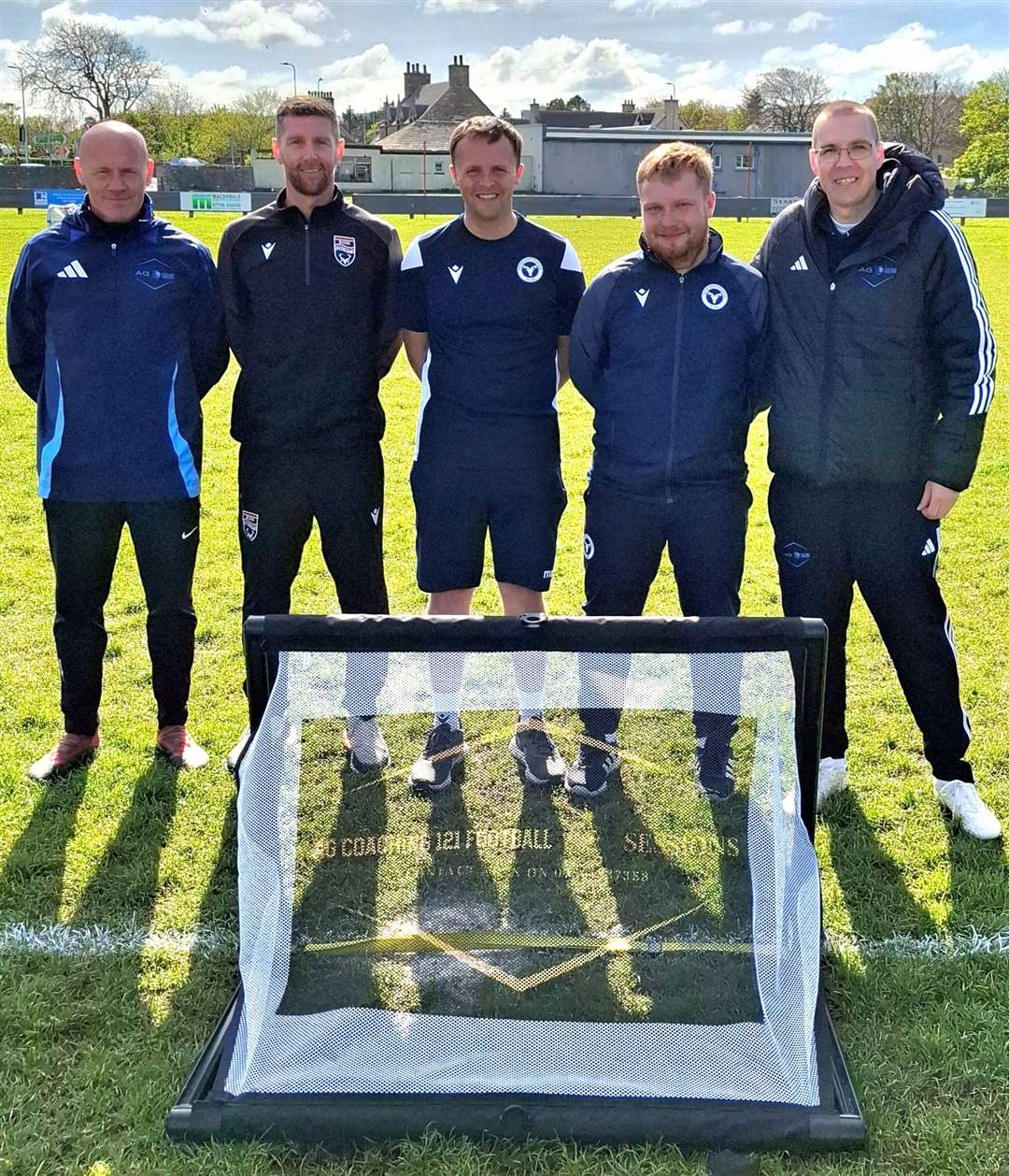 Nigel Mackenzie (left) and Alyn Gunn (right) from AG Coaching alongside the visiting Ross County coaches.