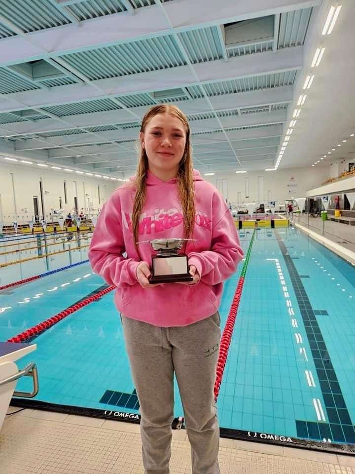 Eva Robertson won the North District junior champion trophy for 200m breaststroke in Aberdeen.