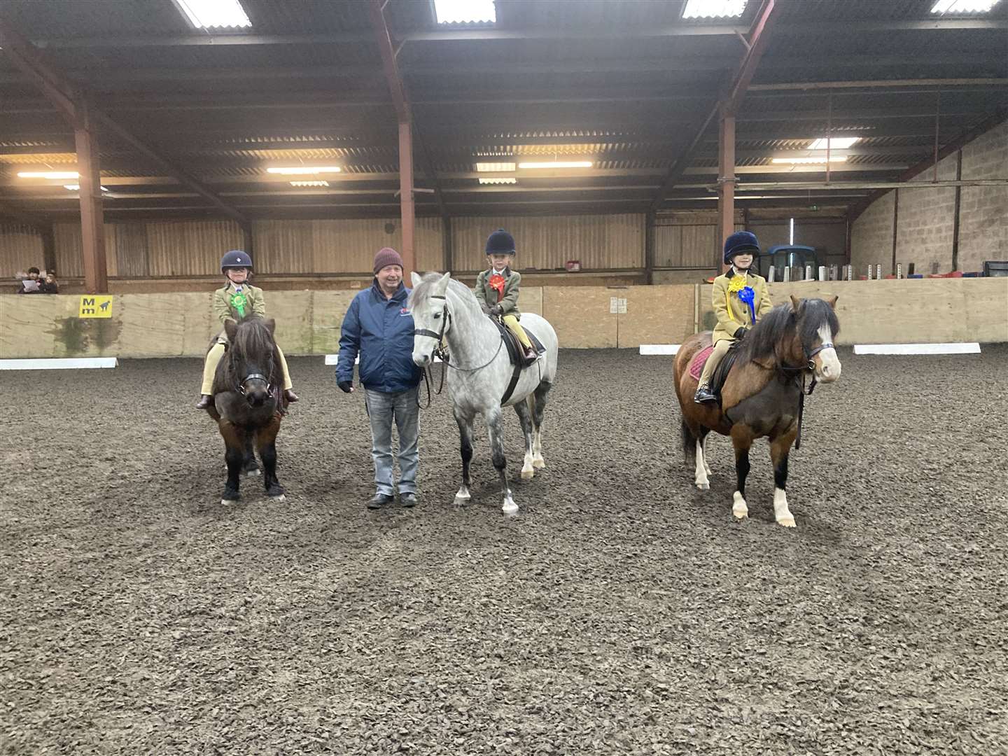 Some of the younger riders from the first test of the day along with the judge. From left to right: Lois Manson, Stephen Cruickshank, Zara Manson and Blaire Patterson.
