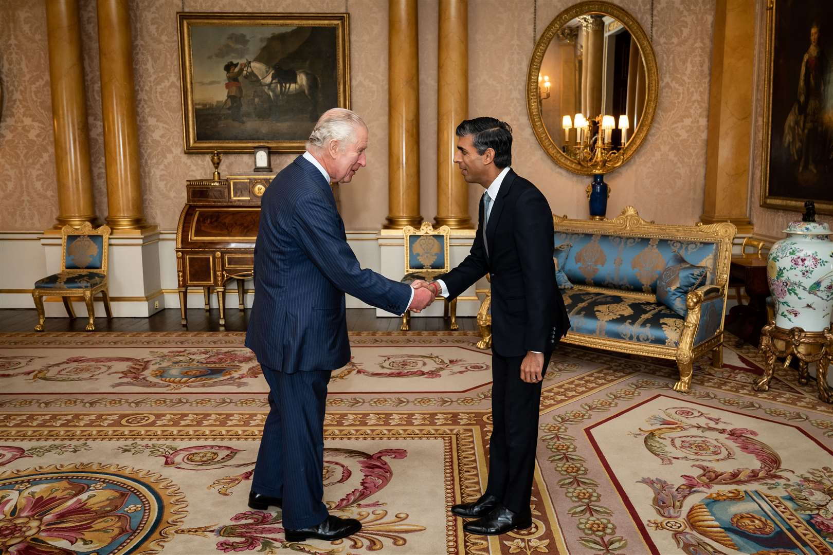 The King welcomes Rishi Sunak during an audience at Buckingham Palace, where he invited the newly-elected Conservative Party leader to become prime minister and form a new government (Aaron Chown/PA)