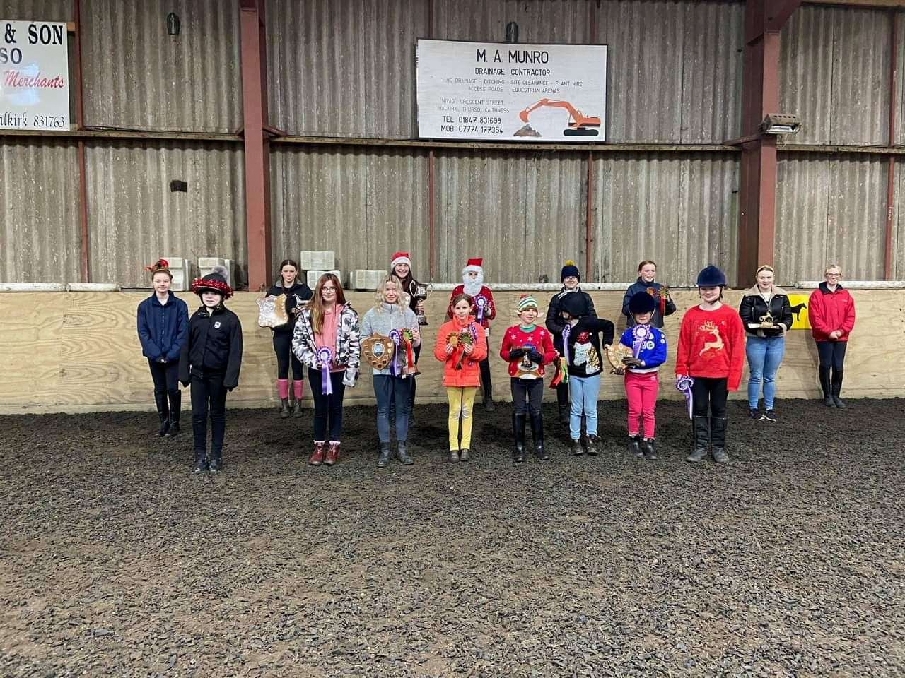 Some of the Caithness Pony Club members who were presented with awards and prizes on the day of the Christmas Show.