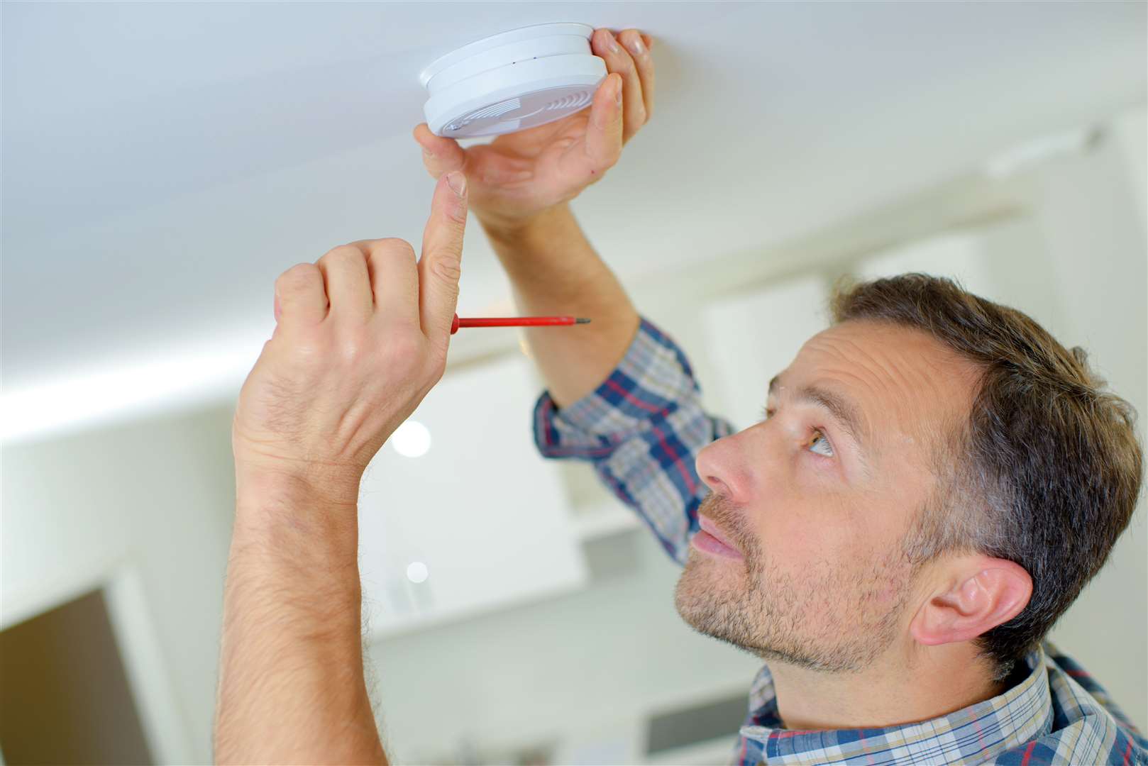 The rules would mean interlinked smoke alarms would need to be fitted in all homes in Scotland.