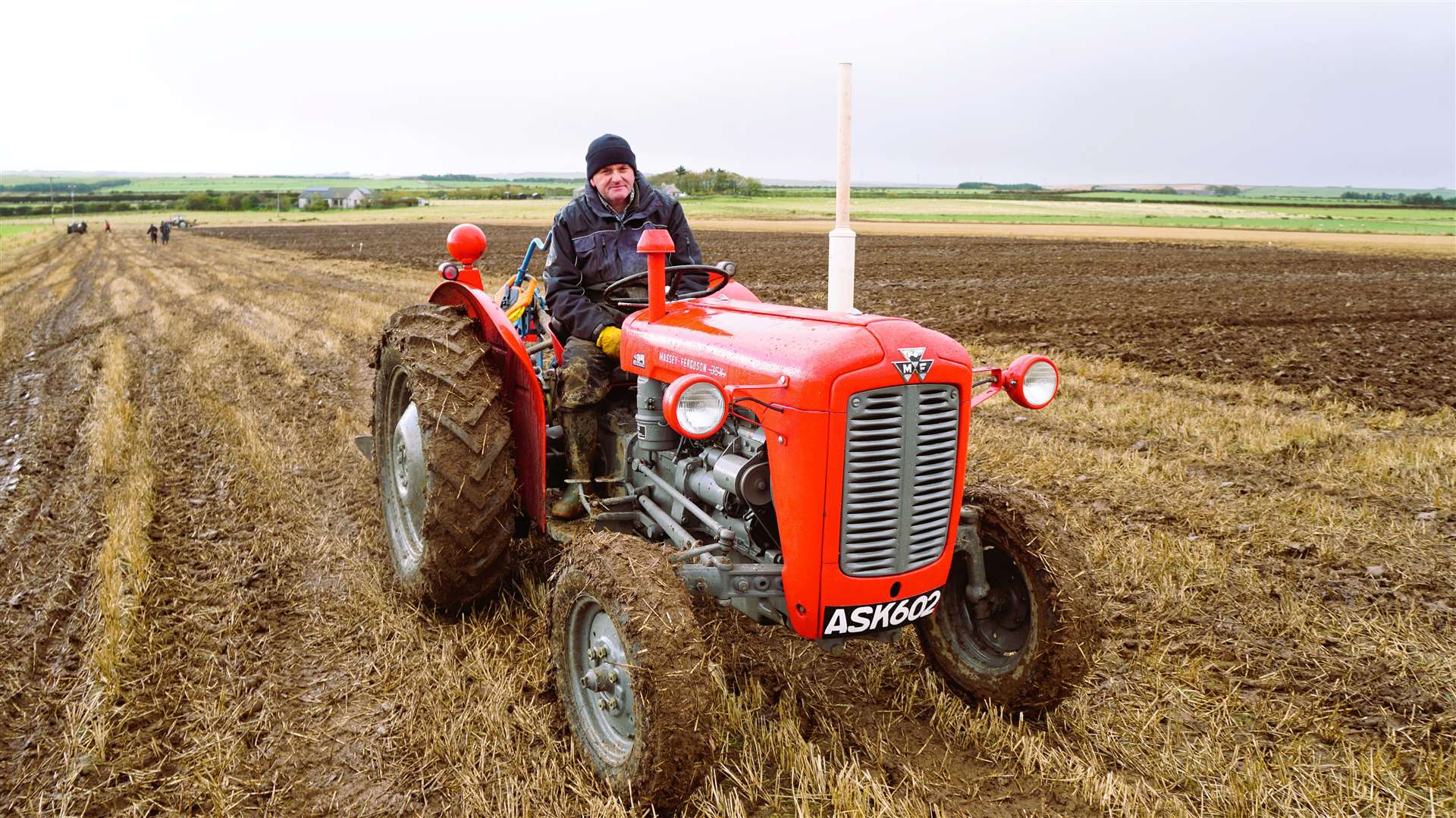 Massey Ferguson leaves the field as conditions worsen. Picture: DGS