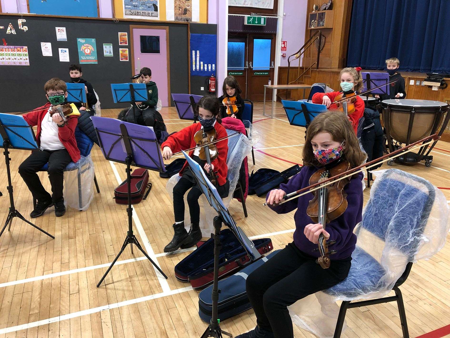 The Caithness Junior Orchestra violins and timpani sections last season.
