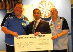 Pictured receiving their prizes from Pietro Matra-Grano, of the Portland Arms Hotel, are Robert Thornton (right), who took the Caithness Classic champion title by beating Keith Stephen in the singles final, along with his pairs partner John Henderson, wit