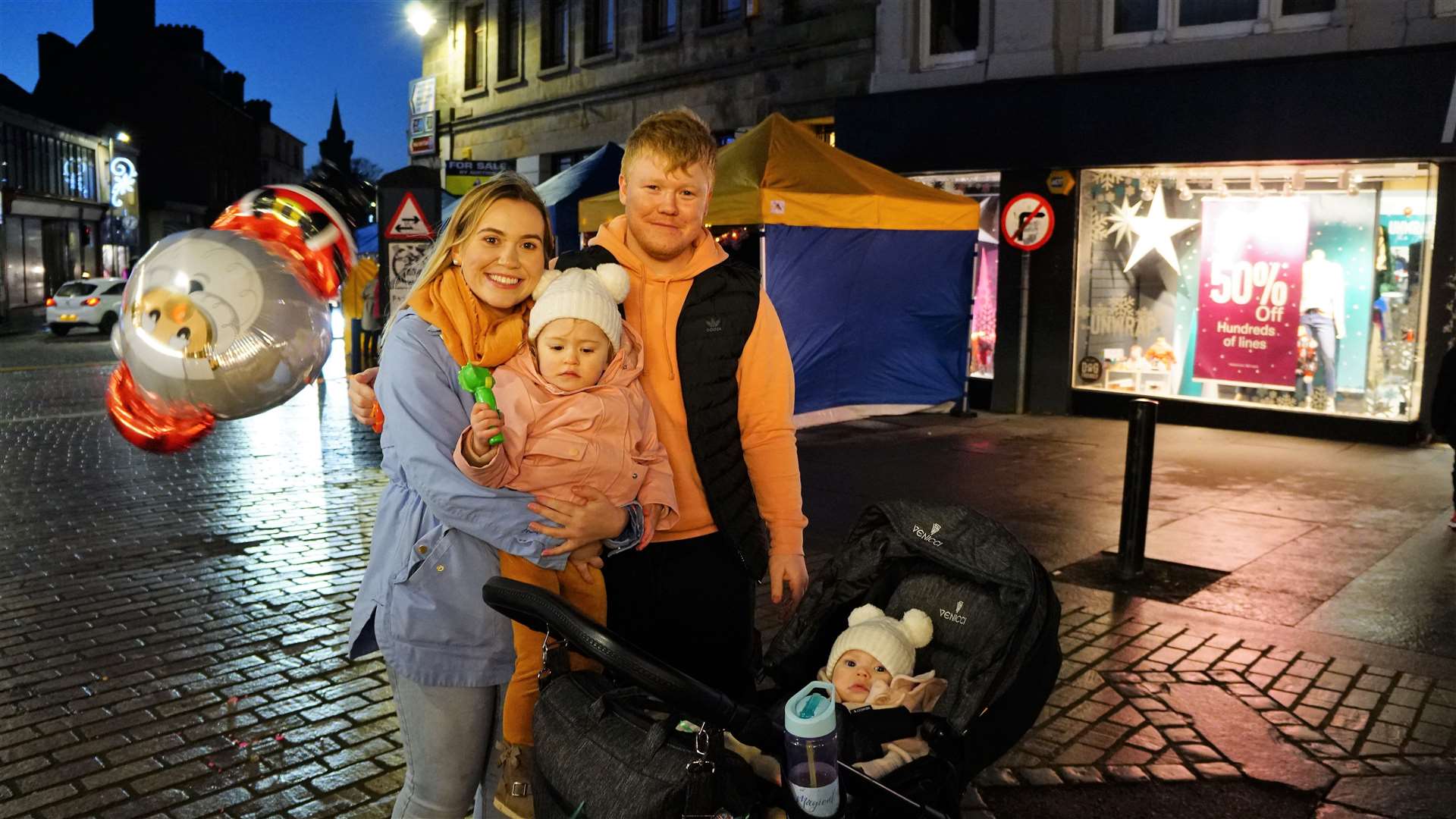 Zara Deas and Craig Manson with their children Evie and Callie. The couple said it was great to see the town centre vibrant again. Picture: DGS