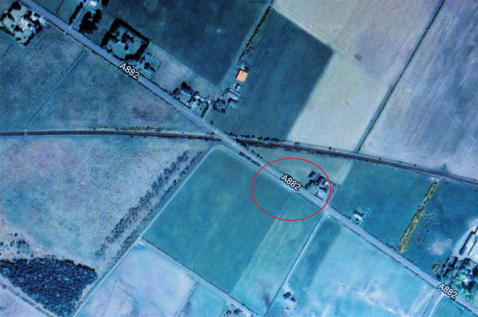 Google Map image showing the A882 and the approximate area where the pothole incident occurred. The curving line shows the rail route and where it crosses the road is a humpback bridge.